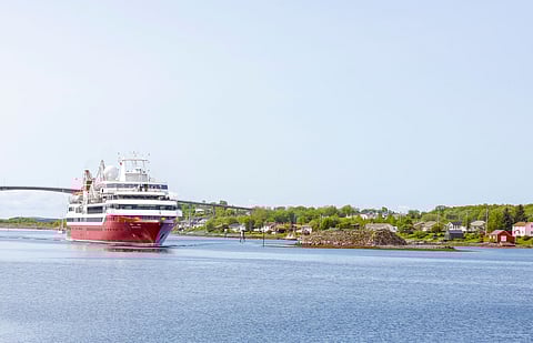 Passenger vessel EXPLORIS ONE sailing under the flag of the Bahamas.