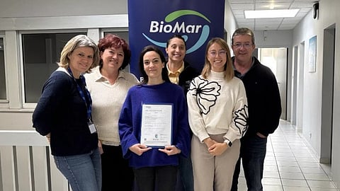 The BioMar team in&nbsp;Nersac, France, displaying the Aquaculture Stewardship Council feed certification.