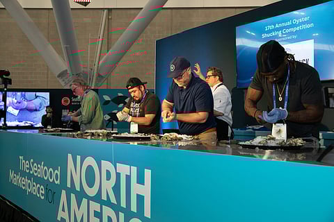 Oyster schucking competition at last year's SENA event.
