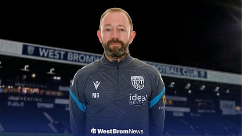 Matt Gill in West Brom attire, with The Hawthorns behind him