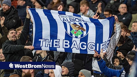 West Brom fans holding a flag