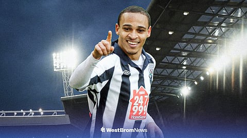 Peter Odemwingie playing for West Brom with The Hawthorns in the background