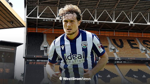 West Bromwich Albion's Callum Styles with Wolverhampton Wanderers' Molineux Stadium background