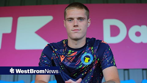 West Brom's Carter Pinnington posing after signing for Solihull Moors on loan