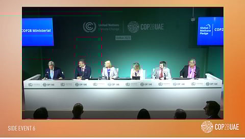 Environment Minister Steven Guilbeault alongside US envoy John Kerry (far left) in Dubai Monday. 