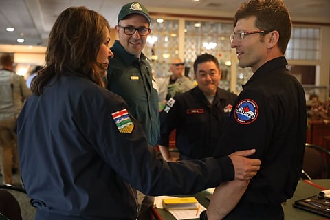 Danielle Smith met with first responders dealing with the Jasper wildfire. 