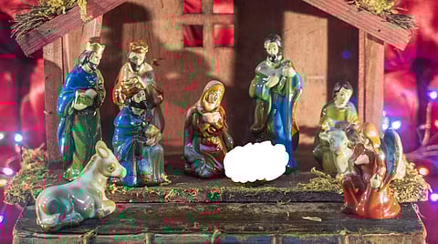 Jesus, Mary, and Joseph in a manger