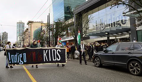 Protest outside Indigo on Robson St. in Vancouver