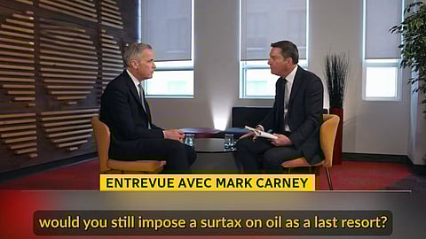 Carney is still open to the idea of a surtax on Alberta oil — in French — despite denying it.