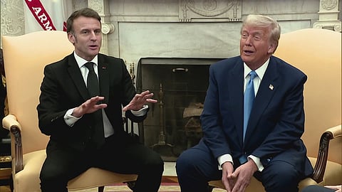 Trump with French president Emmanuel Macron in the Oval Office.