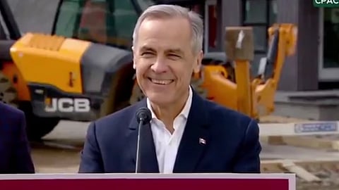Prime Minister Mark Carney takes questions from media in Edmonton on March 20, 2025