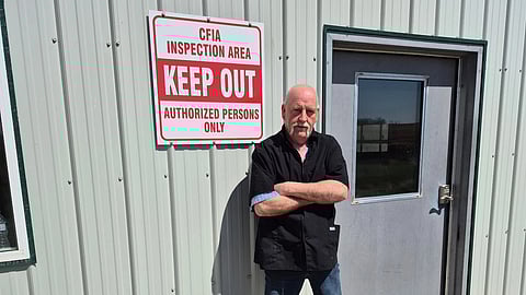 Henk Van Essen on his farm near Lethbridge Alberta 