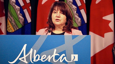 Alberta Health Minister Adriana LaGrange speaks with media at the Alberta Legislature on May 5, 2025
