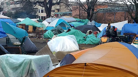 Tent camp on the grounds of the Victoria provincial courthouse, 2016. This camp, established by two people known for organizing tent cities in several southern B.C. communities, was a main motivator of the push by the provincial government to establish supportive housing facilities in urban areas.