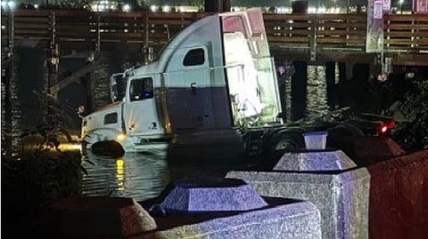 Driver of stolen BC semi ends up in Fraser River after destructive rampage