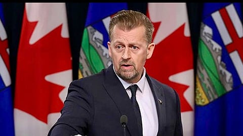 Minister Mike Ellis