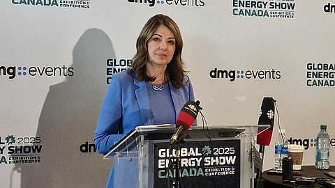 Premier Danielle Smith speaks to reporters after her keynote address at the Global Energy Show in Calgary