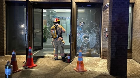 A firefighter on the scene after a firebomb was thrown at Beth Tikvah Synagogue, Montreal, Dec. 18, 2024.