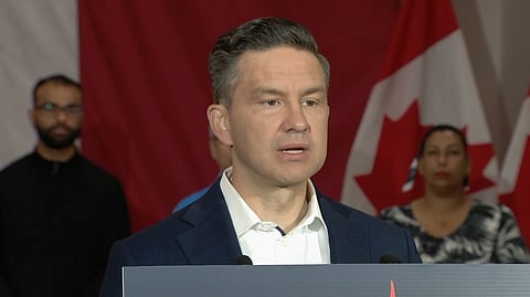 Poilievre addresses reporters in Mississauga ON. 