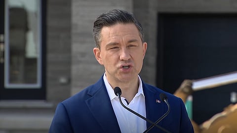 Poilievre speaking with reporters in Brampton