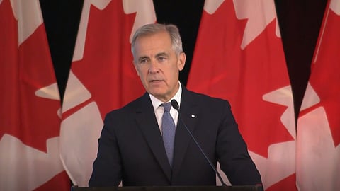 Prime minister Mark Carney speaks to reporters in Edmonton on Wednesday