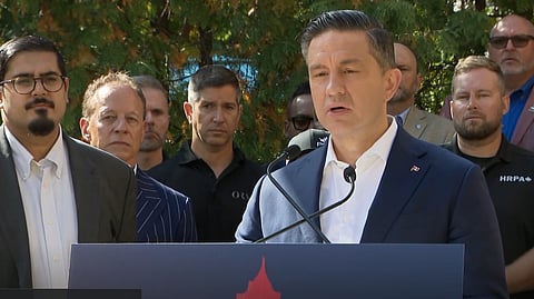 Pierre Poilievre speaks to reporters in Woodbridge on Thursday