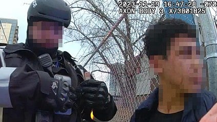 Calgary police cleared after force used on teen protestor who spat at officer
