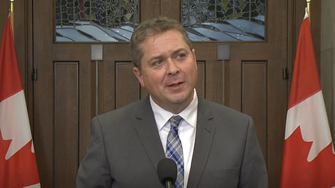 Andrew Scheer speaking to reporters at Parliament on Wednesday