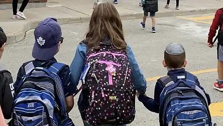 Jewish children going to school