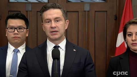 Pierre Poilievre, Vincent Ho and Sandra Cobena speaking to reporters in Ottawa