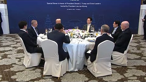 Carney and Trump having dinner together in Korea
