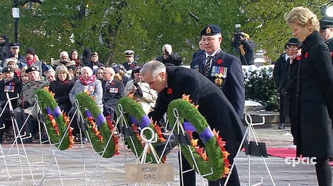 Prime Minister Mark Carney lays a wreath during the National Remembrance Day ceremony in Ottawa. 