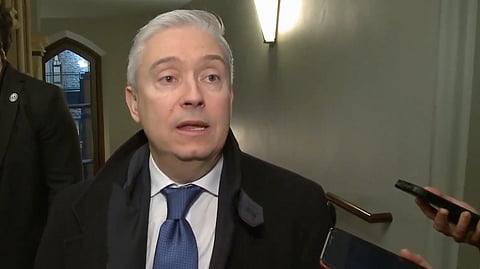 Francois Phillipe Champagne speaking to reporters in Ottawa