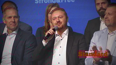 Justice Minister Mickey Amery speaking at the bear pit session at the 2025 AGM