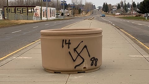 Brooks RCMP investigates surge in white supremacist graffiti and hate stickers

