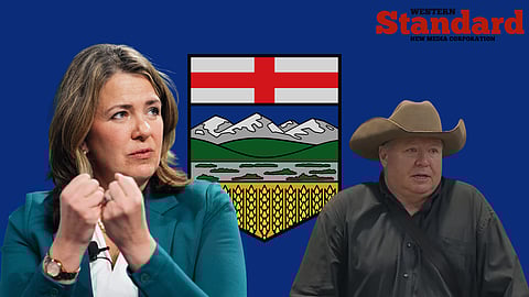 Danielle Smith and Jeff Rath in front of an Alberta flag.