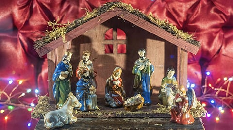 Jesus, Mary, and Joseph in a manger