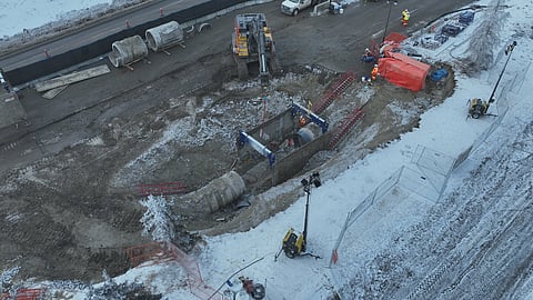 Construction workers are working on the site of the latest break along the Bearspaw South Feeder Main. 