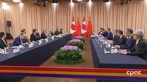 Canadian and Chinese delegations meeting in South Korea last year