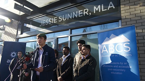 Student union reps rally outside Post-Secondary Education Minister Jessie Sunner's office in Surrey
