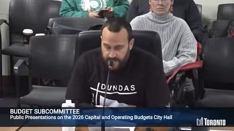 Toronto resident speaking at city hall