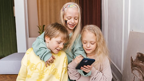 Kids using a phone