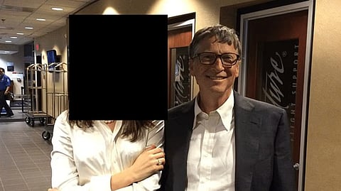 Bill Gate with unidentified woman