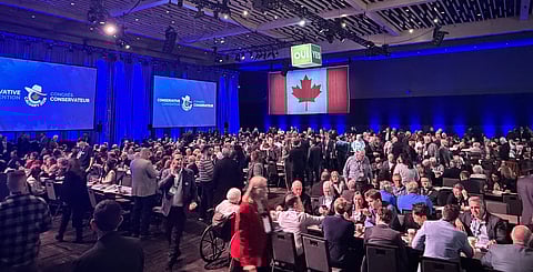 The crowd begins to gather for Premier Danielle Smith's speech on the final day of the Conservative convention in Calgary. 