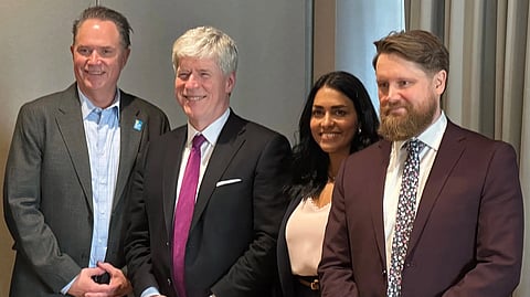 Brad Parry, president and CEO of Calgary Economic Development (far left), Canadian Minister of Energy and Natural Resources Tim Hodgson, Geraldine Anderson, vice president of communications and marketing at Calgary Economic Development, and Financial Post Western Bureau Chief Reid Southwick at an event in Calgary on February 13, 2026. 