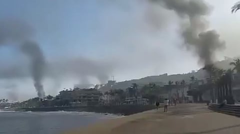 Tourist hub of Puerto Vallarta in chaos after cartels set fires off throughout the city in retaliation for killing of leader 'El Mencho'