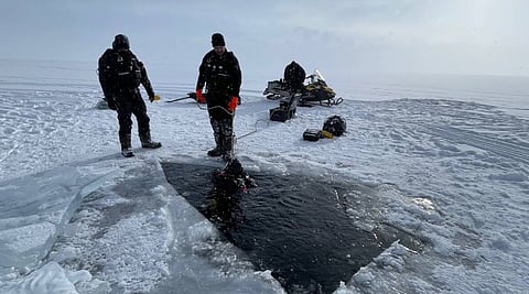ICY TOMB: Two dead after snowmobiles break through ice in BC; ice freezer over them