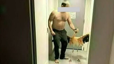 Mitchell Fairbarn holds 'Peachy' by the neck