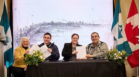 From left: Federal Fisheries Minister Joanne Thompson, Vancouver-Quadra MP Wade Grant (a Musqueam member), Crown-Indigenous Relations Minister Rebecca Alty, and Musqueam Chief Wayne Sparrow sign rights and title agreement in Vancouver, Feb. 20, 2026. 