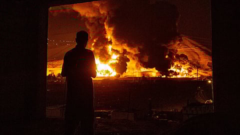 Oil facilities burn near Tehran after Israeli strike